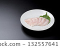 Sawara sashimi served on a plate against a black background 132557641