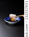 Sawara sashimi served on a plate against a black background 132557651