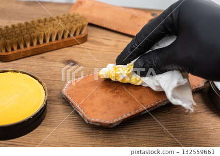 Cleaning the mould on leather product 132559661