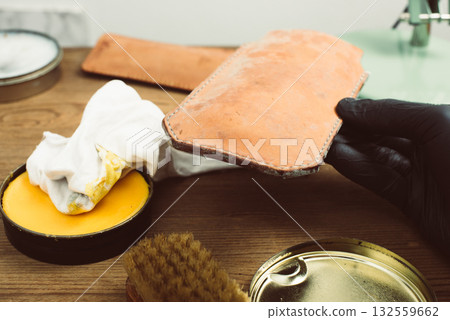 Cleaning the mould on leather product 132559662