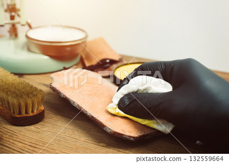 Cleaning the mould on leather product Cleaning the mould on leather product 132559664