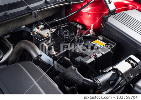 Car battery in the engine room Car battery in the engine room 132559704