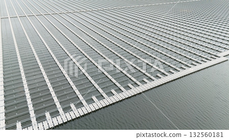 Water buoy platform array for Floating Solar Panel farm. Solar panel PV System in Industry lake Water buoy platform array for Floating Solar Panel farm. Solar panel PV System in Industry lake 132560181
