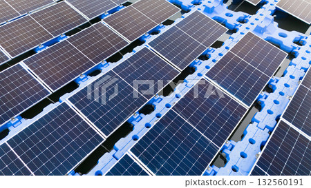Drone view of Floating Solar Panel. Solar photovoltaic panel PV System in Industry lake water pond 132560191