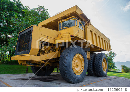 Giant Mining truck, Huge dump truck for coal mine showing in Maemoh coal mine in Lampang Thailand. Giant Mining truck, Huge dump truck for coal mine showing in Maemoh coal mine in Lampang Thailand. 132560248