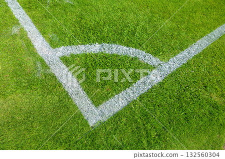Football Corner Kick Area, Free kick pitch area soccer field corner line closeup Football Corner Kick Area, Free kick pitch area soccer field corner line closeup 132560304