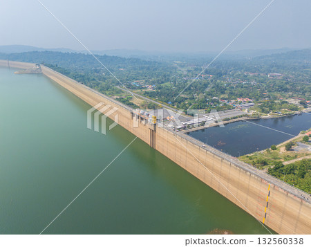 Khuean Khun Dan Prakanchon Dam in Thailand with low water level reserved in dry summer season 132560338