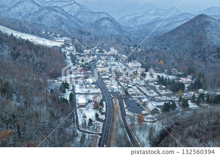 Aerial photo of Nukabira Onsen, where the first snow fell at the end of October – Kamishihoro Town, Hokkaido 132560394