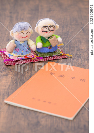 Elderly couple and pension book Elderly couple and pension book 132560941