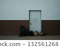 An immigrant family's luggage left at the door 132561268