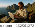A nomad worker working in a spectacular setting 132561272