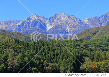 Autumn Hakuba mountain range seen from Tsugaike Bridge 132561284