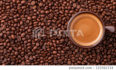 Artistic arrangement of coffee beans in heart shape with cup of coffee highlighting love for caffeine Artistic arrangement of coffee beans in heart shape with cup of coffee highlighting love for caffeine 132562154