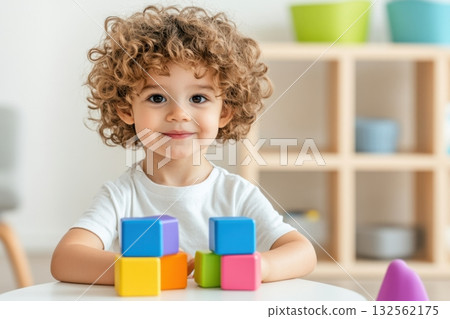 Bright and cheerful occupational therapy session with a young child practicing motor skills using colorful toys in a supportive environment 132562175