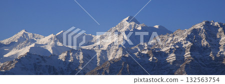 Snow capped peaks of the Zanskar Range in autumn, Stok Kangri. View from Leh, India. Snow capped peaks of the Zanskar Range in autumn, Stok Kangri. View from Leh, India. 132563754