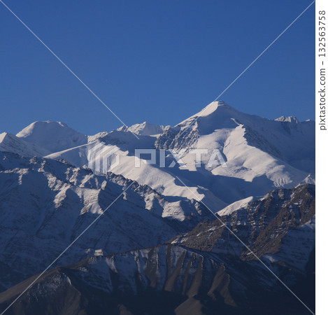 Stok Kangri, mountain of the Zanskar Range seen from Leh, India. 132563758