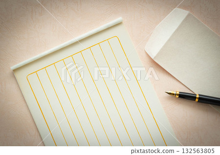 Writing a letter: Letter paper, envelope and fountain pen Writing a letter: Letter paper, envelope and fountain pen 132563805