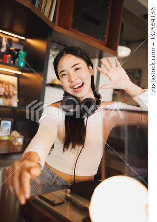 DJ Asian women young teen with music player, party sound entertainment happy smiling expression 132564136