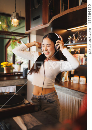 DJ Asian women young teen with music player, party sound entertainment happy smiling expression 132564150
