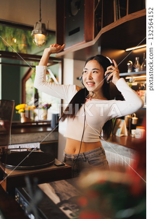 DJ Asian women young teen with music player, party sound entertainment happy smiling expression 132564152