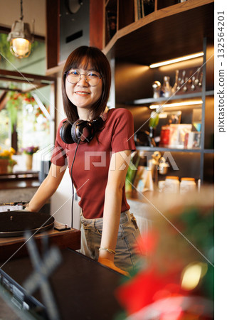 DJ Asian women young teen with music player, party sound entertainment happy smiling expression 132564201