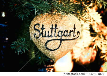 Golden heart on Christmas tree 132564872