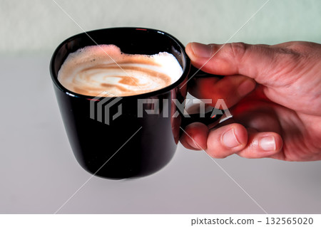 A Cozy Moment with a Cup of Coffee. 132565020