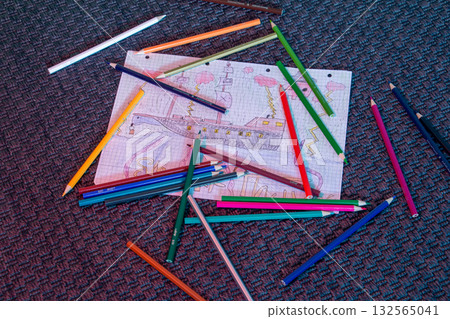 Colorful Pencils and a Simple Ship Drawing. 132565041