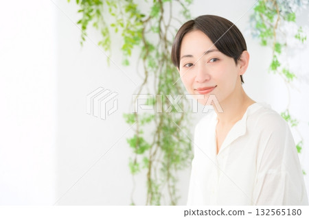 Japanese woman relaxing in a bright room 132565180