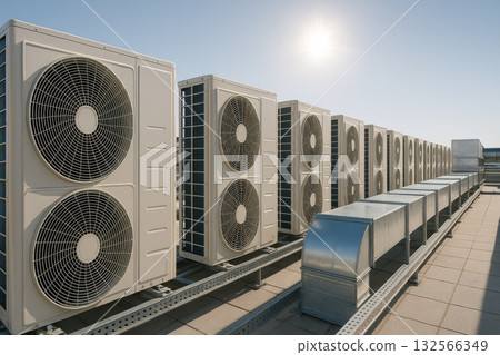 Industrial rooftop HVAC system with aligned outdoor cooling units. powerful display of modern air conditioning technology and energy efficiency under bright sunlight 132566349