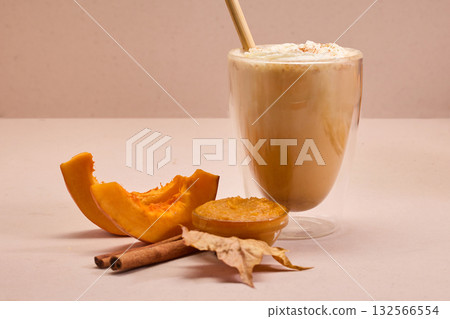 Autumn Pumpkin spice Latte Delight. Pumpkin spice lattes with cinnamon, pumpkin slices, and autumn leaves Autumn Pumpkin spice Latte Delight. Pumpkin spice lattes with cinnamon, pumpkin slices, and autumn leaves 132566554