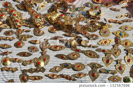 National women's jewelry made of silver and tin with semi-precious stones. Turkmenistan. Ashkhabad market. 132567896