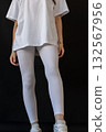 Model wearing white leggings highlighting shape, Mockup presenting waist and overall contour clearly 132567956