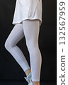 Model wearing white leggings highlighting shape, Mockup presenting waist and overall contour clearly 132567959