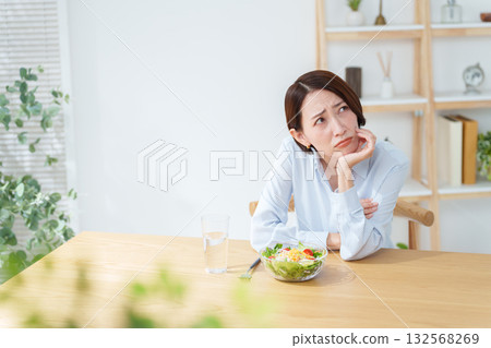 A woman who doesn't like salad A woman who doesn't like salad 132568269