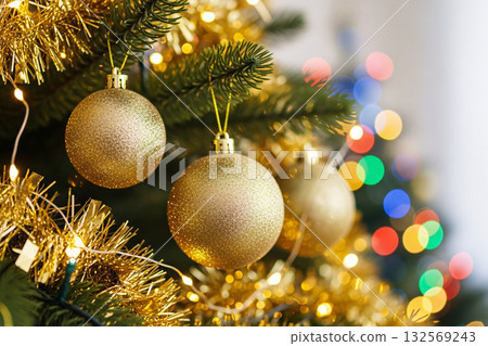Christmas Tree with Golden Ornaments and Lights Christmas Tree with Golden Ornaments and Lights 132569243