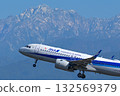 Toyama Airport, Mount Tsurugi and All Nippon Airways aircraft 132569379