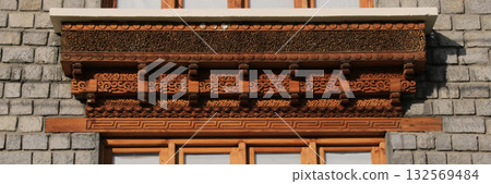Traditional ornated timber lintel in Leh, India. Traditional ornated timber lintel in Leh, India. 132569484