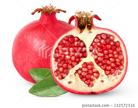 Ripe pink pomegranate fruit and cut in a half with seeds isolated with green leaves. Ripe pink pomegranate fruit and cut in a half with seeds isolated with green leaves. 132572316