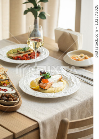Grilled salmon fillet with mashed potatoes and sauce Grilled salmon fillet with mashed potatoes and sauce 132573026