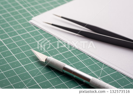 Different stationery equipment before origami making. Modeling different things with a help of paper Different stationery equipment before origami making. Modeling different things with a help of paper 132573516