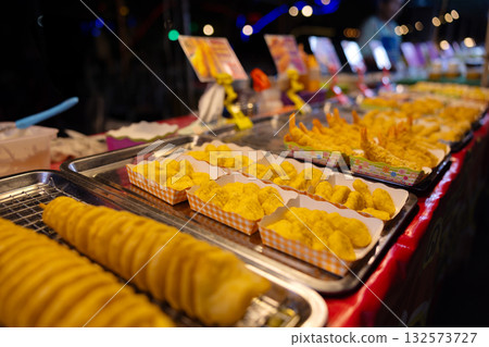 Authentic Street Food Display at a Vibrant Night Market in Thailand 132573727