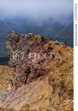 Climbers standing on the crater rim of Mt. Meakan - Feeling the heartbeat of the earth Climbers standing on the crater rim of Mt. Meakan - Feeling the heartbeat of the earth 132573924