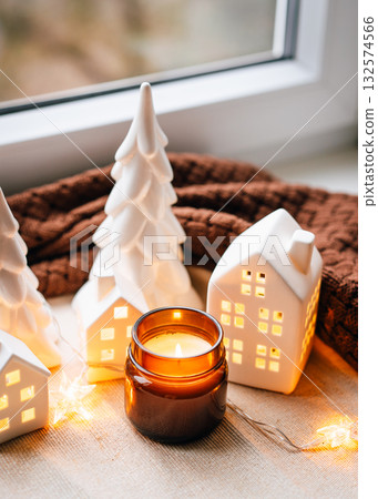 Cozy Christmas Village Miniatures With Candlelight And Warm Home Decor Scene 132574566