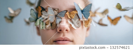 Close-up of a person with butterfly glasses, surrounded by colorful butterflies, symbolizing mental health and neurodiversity concepts in a serene atmosphere 132574621