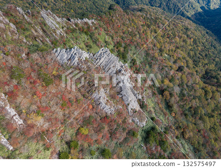 Autumn leaves on Mt. Ishizuchi Graveyard Ridge Autumn leaves on Mt. Ishizuchi Graveyard Ridge 132575497