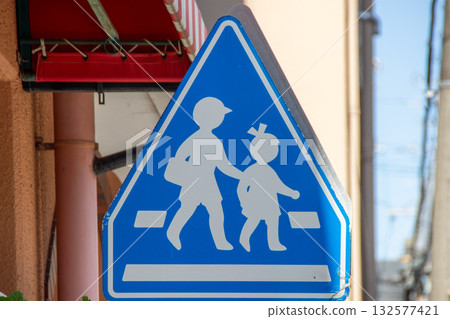 Pedestrian crossing road sign (with two children) Pedestrian crossing road sign (with two children) 132577421