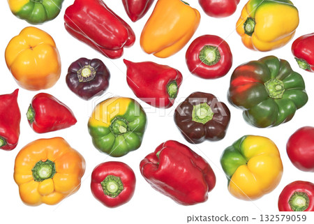 Whole different colored sweet peppers isolated on a white background 132579059