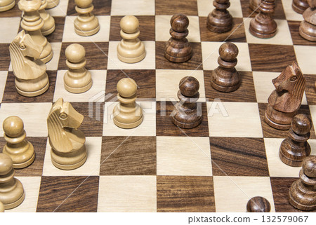 Wooden chessboard with figures close up 132579067