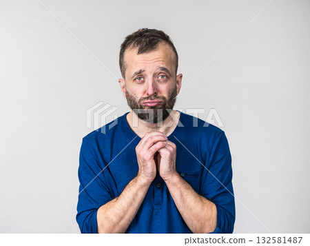 Man begging or apologizing 132581487